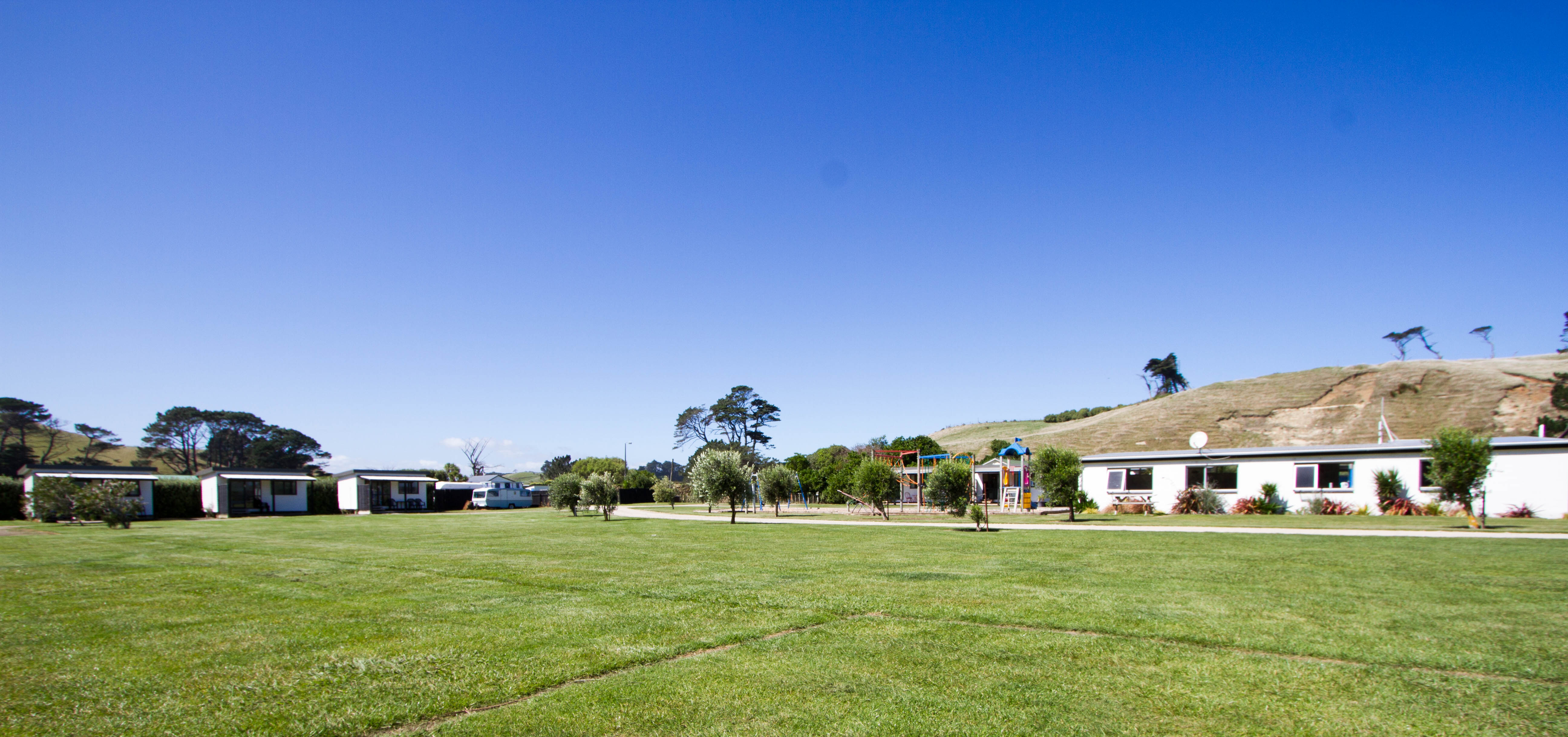 Holiday park lawns and cabins
